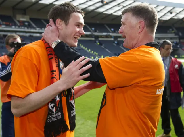 Keith Watson (left) celebrates United's 2010 Cup win with coach Paul Hegarty