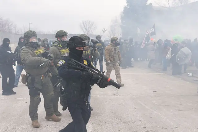 Federal agents clash with protestors outside an ICE facility in Minneapolis, Minnesota.