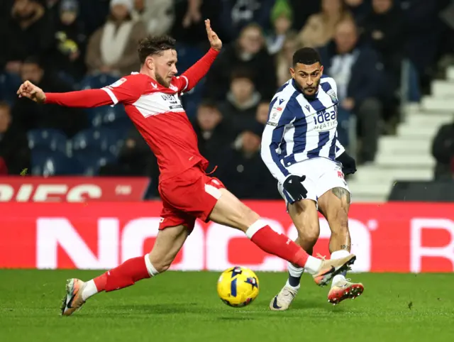 Alan Browne of Middlesbrough and Karlan Grant of West Bromwich Albion