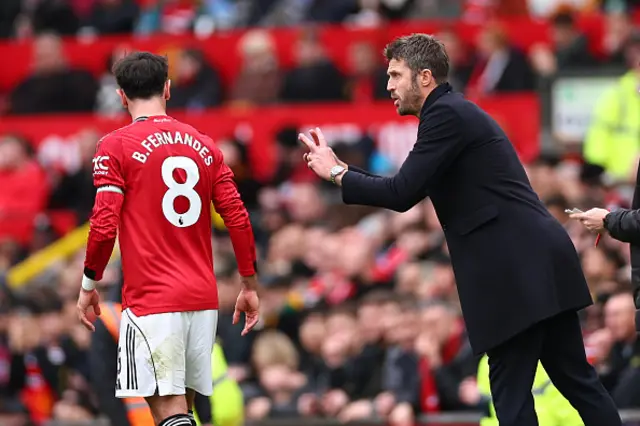 Michael Carrick instructs Bruno Fernandes