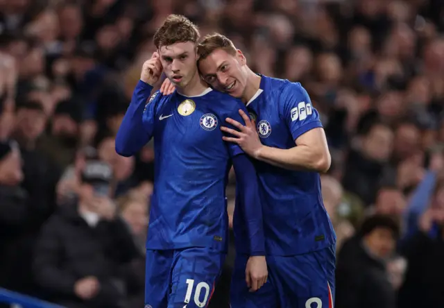 Chelsea's Cole Palmer celebrates scoring their second goal with Liam Delap