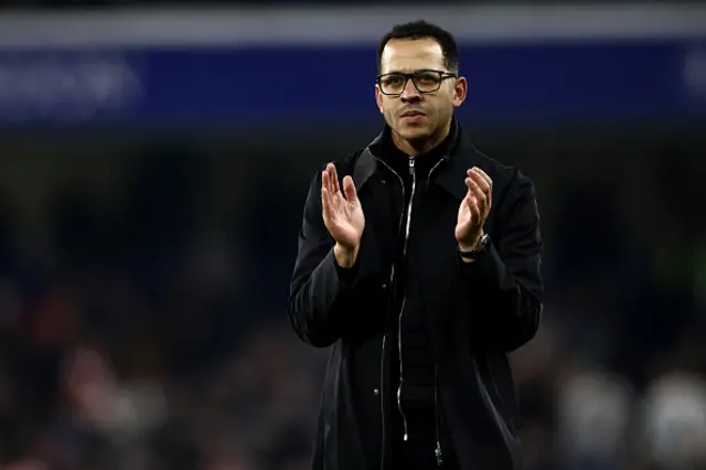 Chelsea's English head coach Liam Rosenior applauds the fans