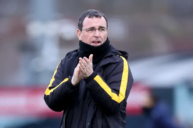 Burton Albion Manager Gary Bower applauding.