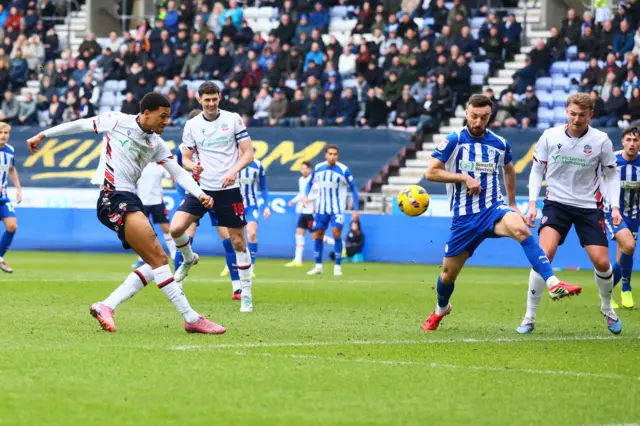 Mason Burstow of Bolton Wanderers misses a chance to score