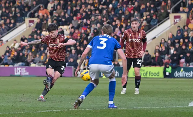 Jenson Metcalfe of Bradford City scores
