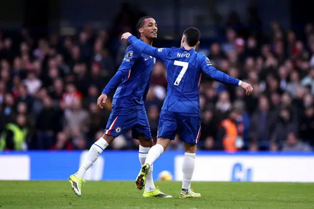 Chelsea's Brazilian striker #20 Joao Pedro celebrates scoring the team's first goal