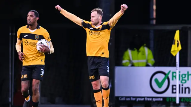 Scott Arfield celebrates scoring for Livingston
