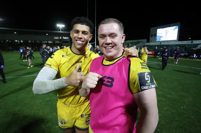 Dragons' Rio Dyer and Brodie Coghlan celebrate after the win against Newcastle