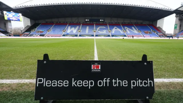 Keep off the pitch sign at Wigan ahead of Bolton match