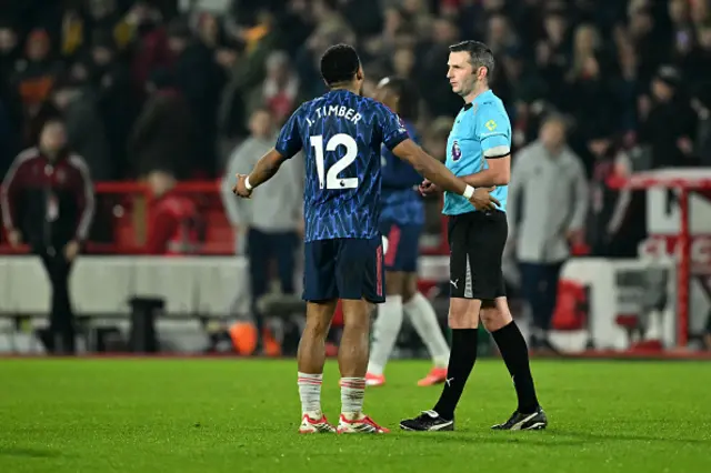 Jurrien Timber speaks to Referee Michael Oliver