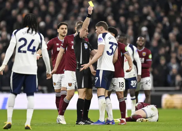 Tottenham yellow card.