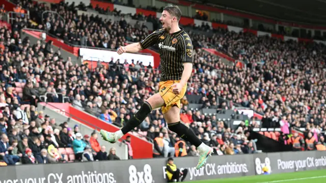 Charlie Hughes celebrates scoring