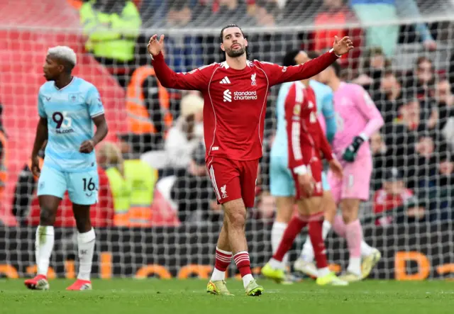 Liverpool's Dominik Szoboszlai reacts