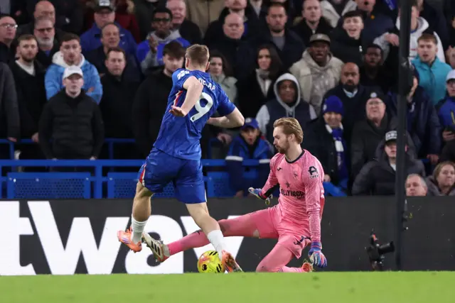 Chelsea's Liam Delap is fouled by Brentford's Caoimhin Kelleher in the penalty area