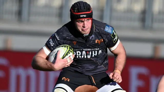 James Fender carries the ball for Ospreys at Zebre Parma