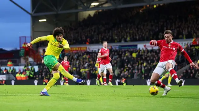 Jovon Makama firing home Norwich's winning goal at Wrexham