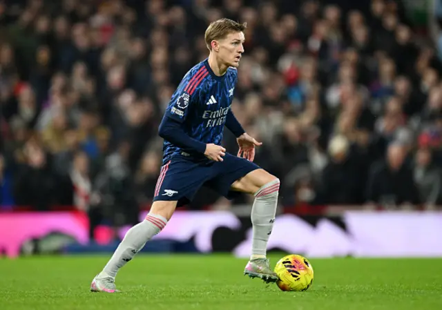 Martin Odegaard of Arsenal runs with the ball