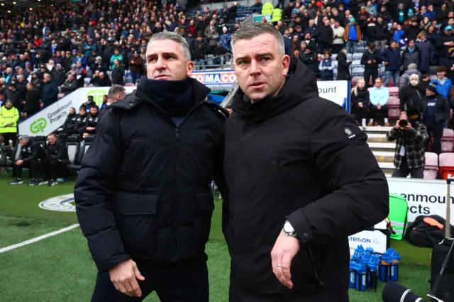 Wigan Athletic manager Ryan Lowe and Bolton Wanderers manager Steven Schumacher