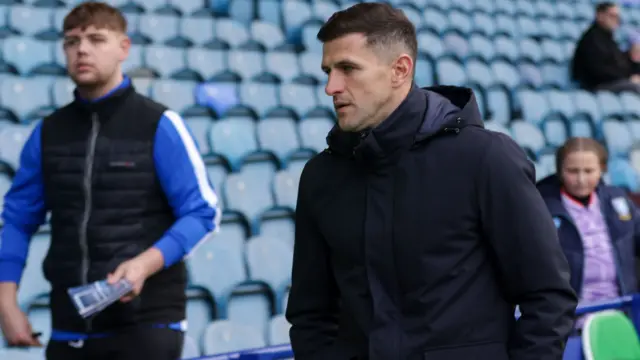 Portsmouth manager John Mousinho arrives at Hillsborough