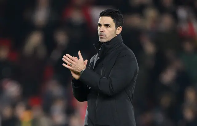 Mikel Arteta, Manager of Arsenal, applauds the fans
