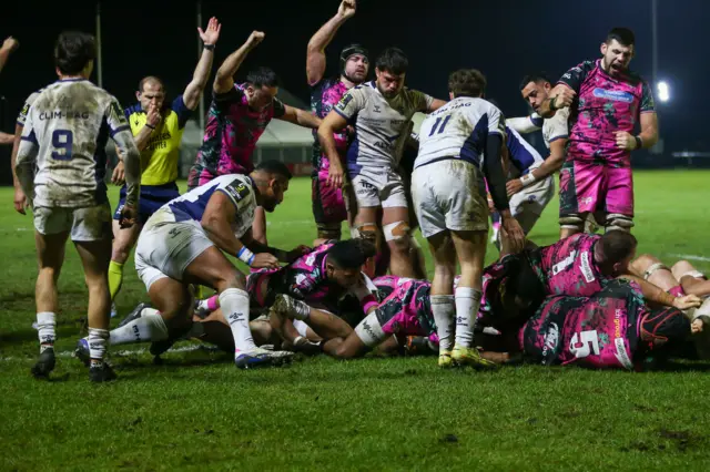 Referee Federico Vedovelli awards a try scored by Lewis Lloyd of Ospreys