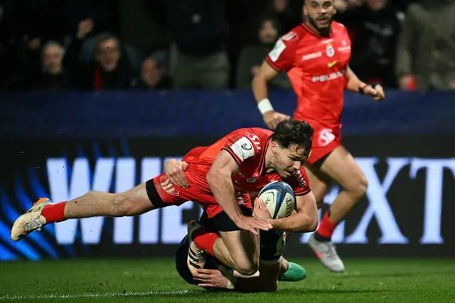 Antoine Dupont dives to touch down for a try