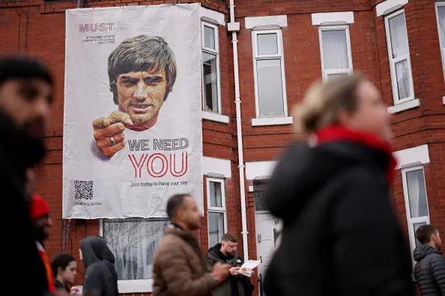 Manchester United fans arrive at the stadium