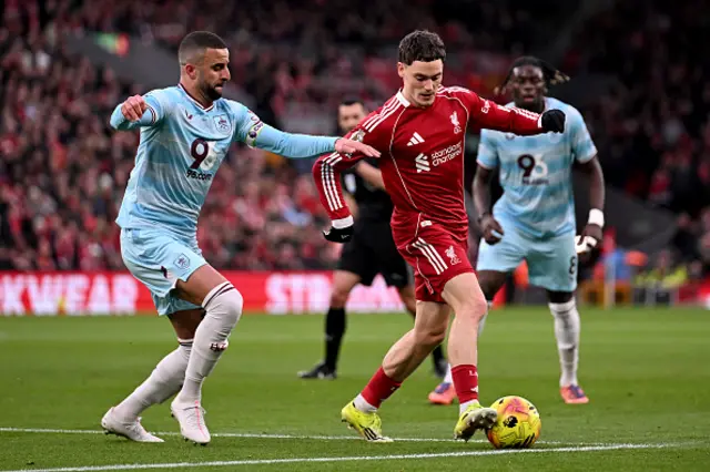 Kyle Walker of Burnley battles for possession with Florian Wirtz