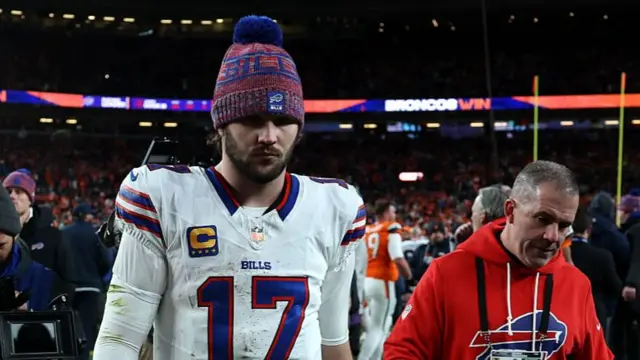 Josh Allen leaves the field after the Buffalo Bills lose to the Denver Broncos