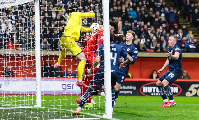 Aberdeen's Jack Milne scores