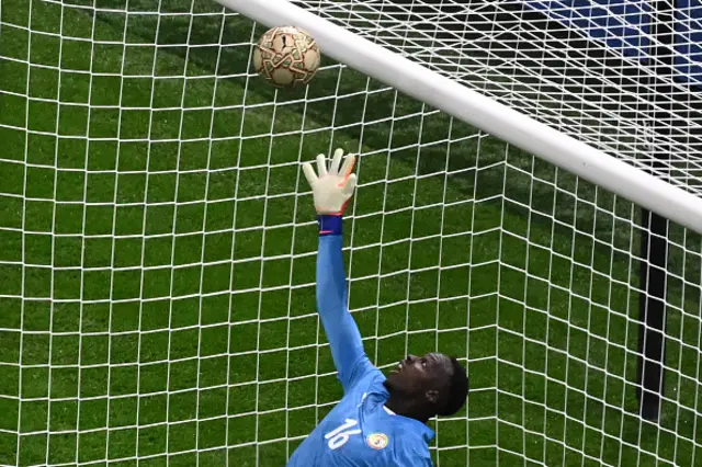 Edouard Mendy makes a save