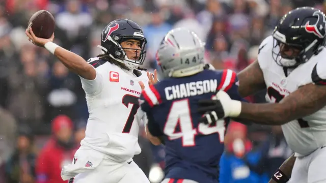 Houston Texans quarterback CJ Stroud throws a pass against the New England Patriots