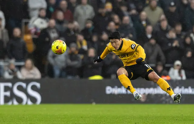 Wolverhampton Wanderers' Hwang Hee-Chan plays the ball forward