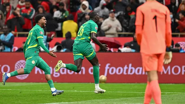Pape Gueye celebrates scoring a goal