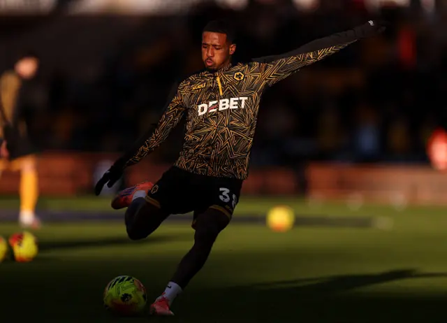 Jackson Tchatchoua of Wolverhampton Wanderers warms up