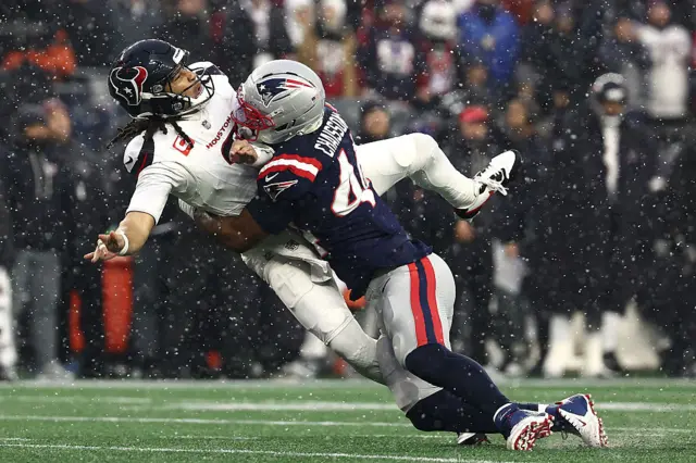 CJ Stroud is taken to the ground