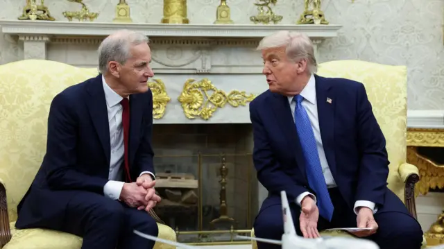 U.S. President Donald Trump meets with Norway's Prime Minister Jonas Gahr Stoere in the Oval Office of the White House in Washington, D.C., U.S., April 24, 2025.