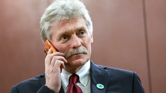 Kremlin spokesman Dmitry Peskov attends a meeting of Russian President Vladimir Putin