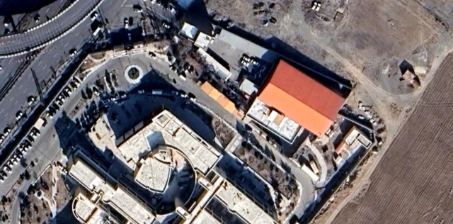 A red-roofed building seen in satellite mapping of southern Tehran