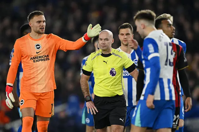 Bart Verbruggen of Brighton & Hove Albion concedes a penalty against Amine Adli of Bournemouth
