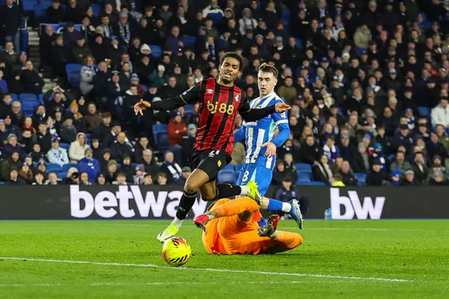 Bart Verbruggen of Brighton & Hove Albion concedes a penalty against Amine Adli of Bournemouth