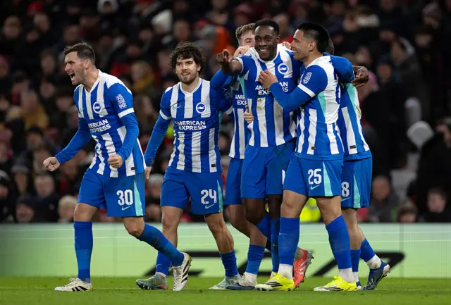Brighton players celebrate Welbeck's goal against Man Utd