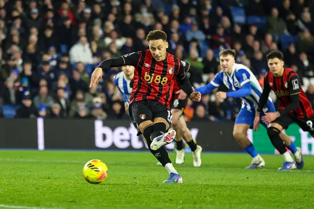 Marcus Tavernier of Bournemouth scores a goal from the spot