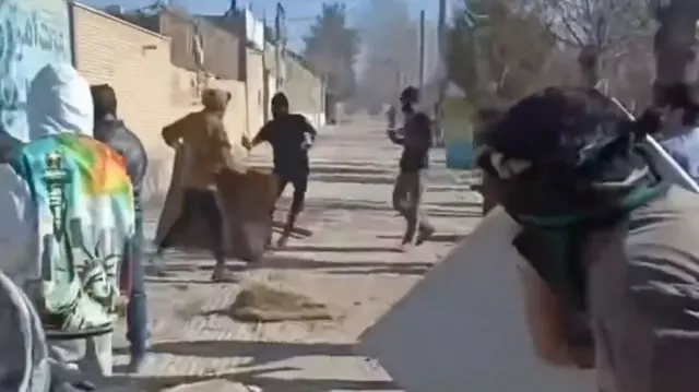 Masked protesters in Lordegan