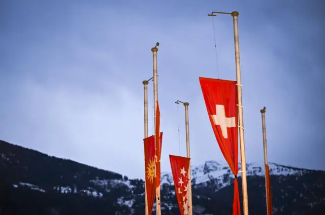 The Swiss and Valais cantonal flags fly at half-mast in Sierre, Switzerland