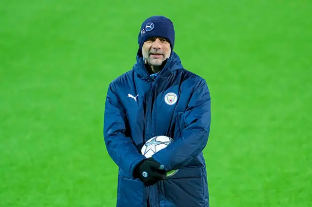 Pep guardiola during man city warm up