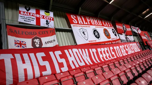 Flags at Salford's Peninsula Stadium