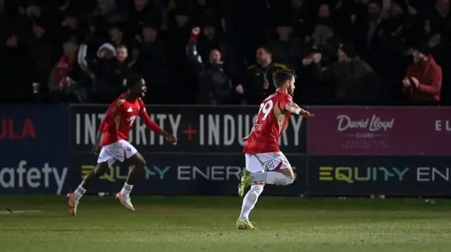 Luke Garbutt celebrates