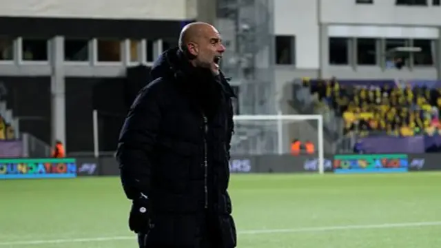 Pep Guardiola reacting