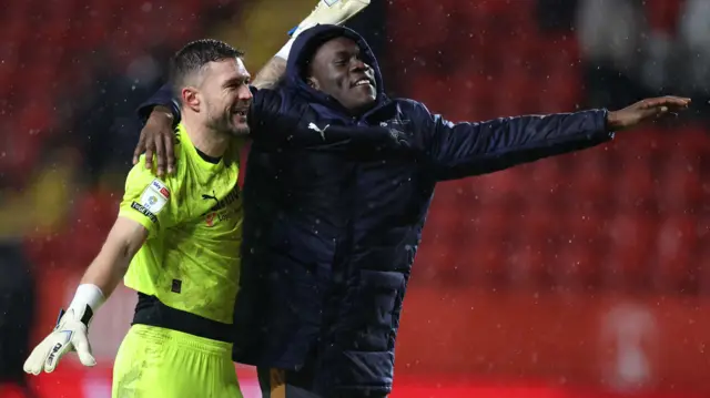 Derby goalkeeper Richard O'Donnell celebrates at full-time at Charlton
